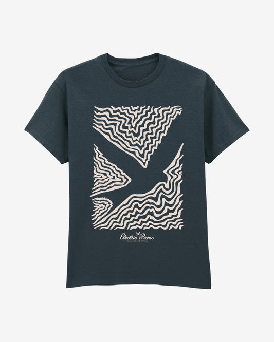 A black event t-shirt by Electric Picnic featuring an abstract white wavy line pattern on the front, with Electric Picnic written in a cursive font near the bottom of the design.