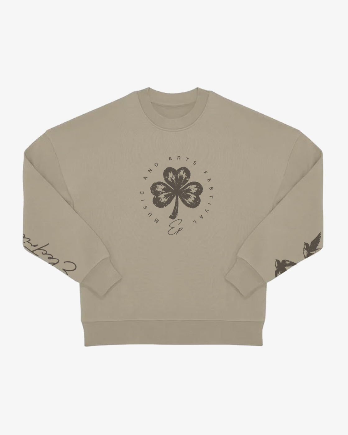 Introducing the EP 2026 Click & Collect Vintage Clover Crewneck Natural—a beige crewneck sweatshirt featuring a bold black four-leaf clover graphic and circular “Music and Arts Festival” text on the front, complemented by black printed designs on both sleeves.