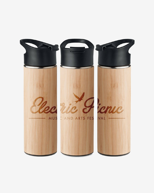 Three Electric Picnic Water Bottles with light wood-patterned bodies and black lids are displayed side by side. The middle bottle features the Electric Picnic Music and Arts Festival logo with a bird graphic.